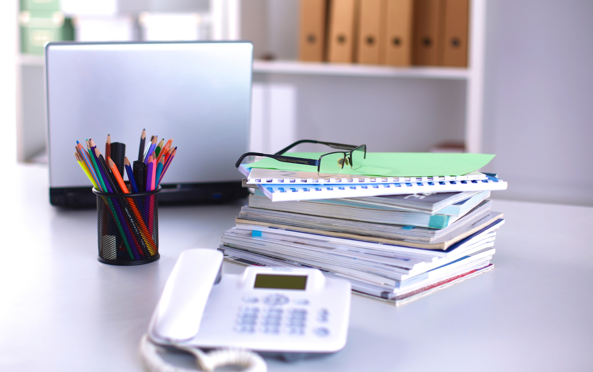 Office desk with desk contents 